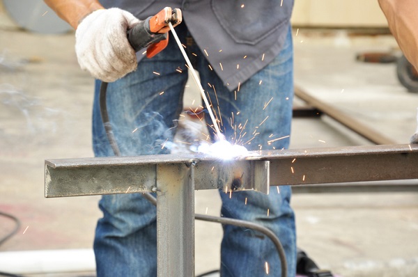 SMAW isn’t as sensitive to wind as gas shielded arc welding can be