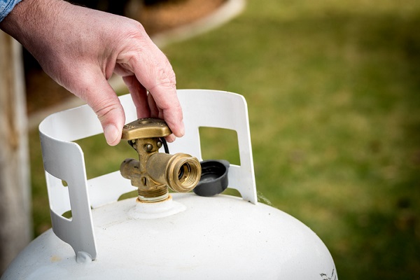 Propane has a relatively low flame temperature and flammability range