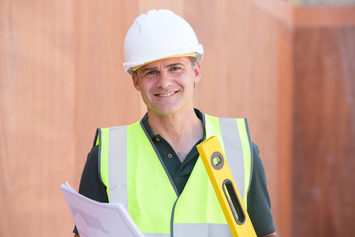 Home inspector smiling at the camera after home inspection training.