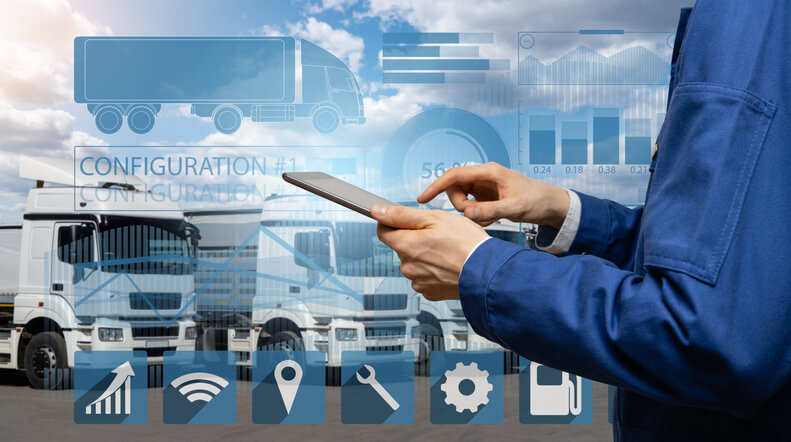 A logistics manager using supply chain management software after logistics management courses