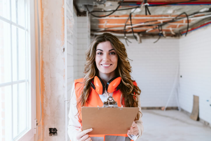 A smiling female home renovation technician after home renovation training