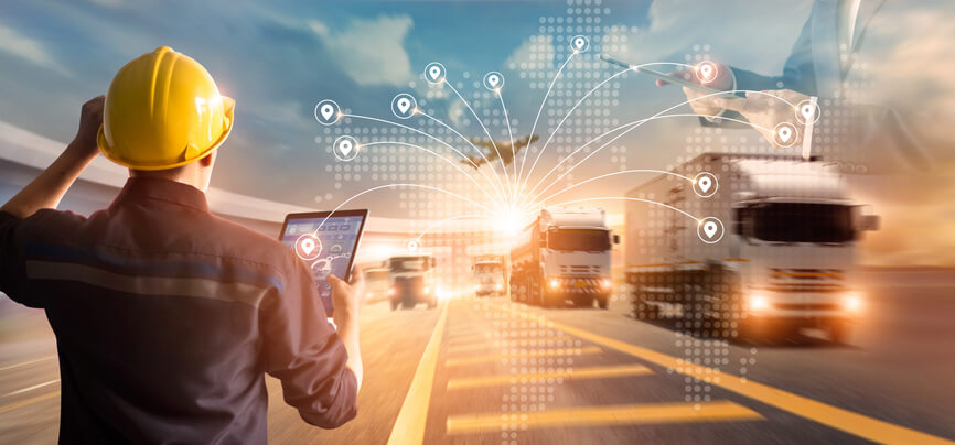 A logistics manager using AI software for route planning after logistics management training.