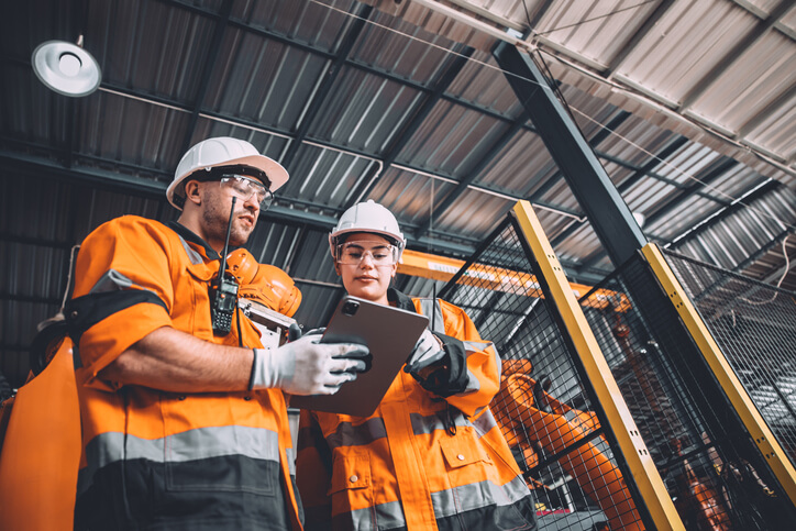 Professional welders at a construction site after welder training